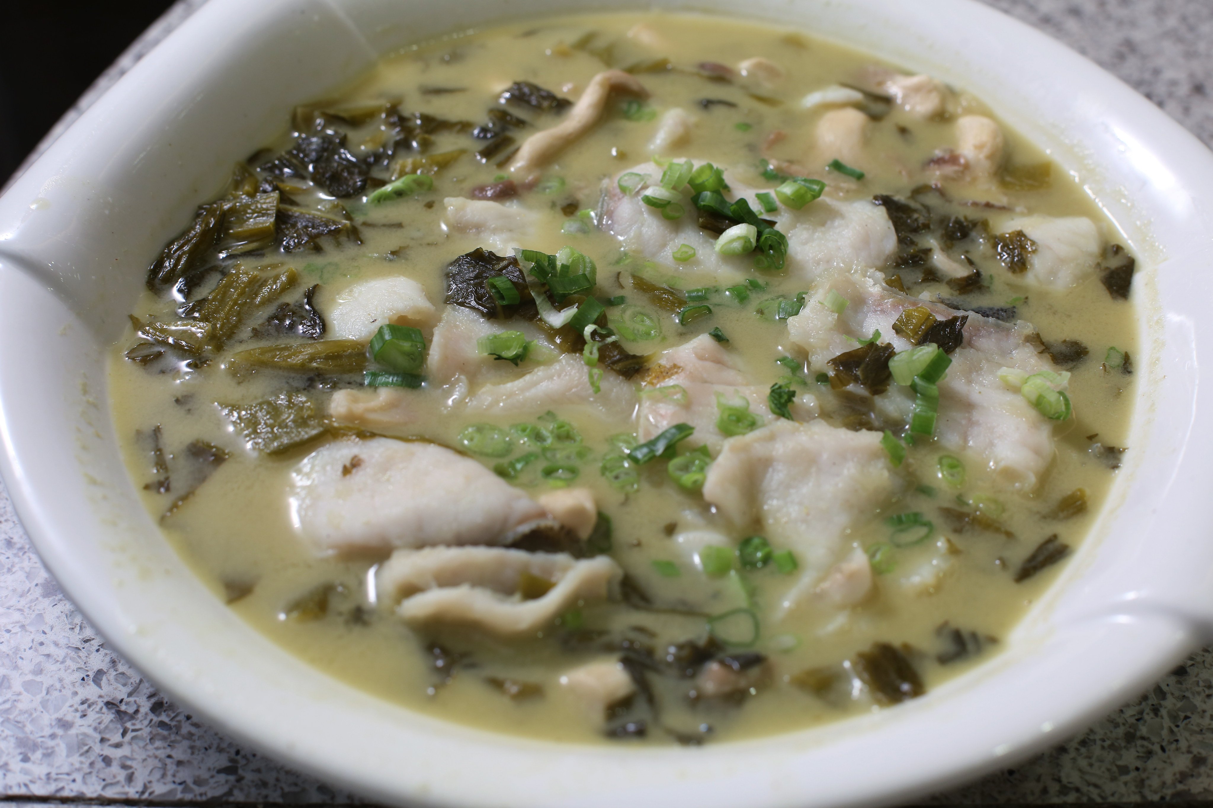 Pickled mustard cabbage and stewed fish at San Xi Lou. Photo: Edmond So